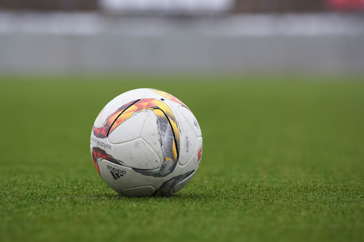 closeup-of-soccer-ball-in-field-https://unsplash.com/photos/white-and-gray-adidas-soccerball-on-lawn-grass-qWs_Wa1JrKM